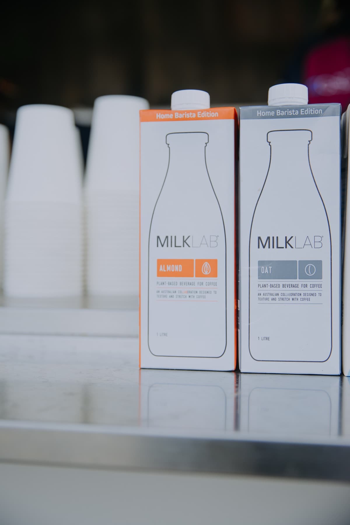 Alternative milks lined up on the van bench